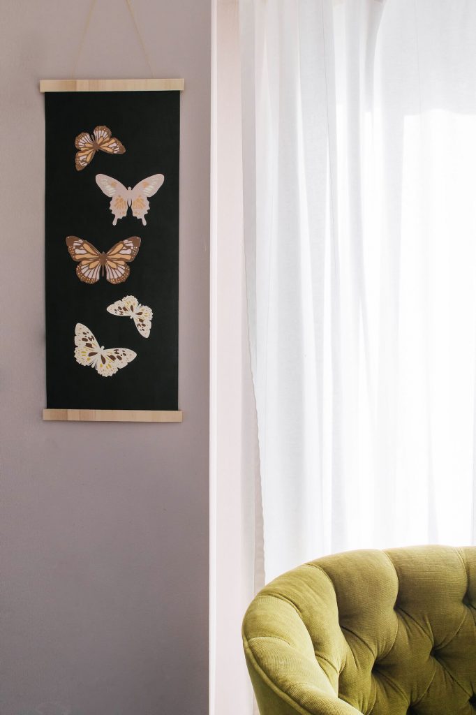 Home decor Cricut project using layered butterfly SVGs.